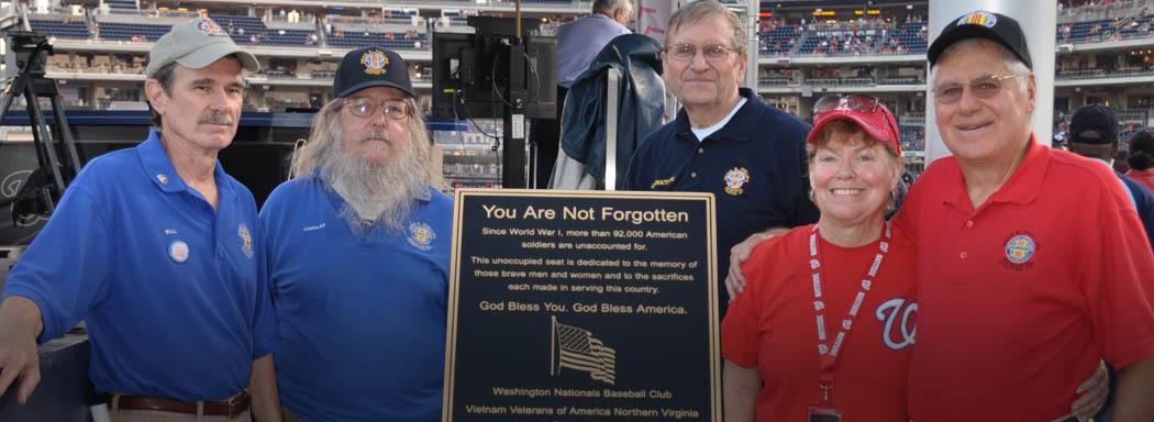 Chapter members and other attendees at the POW/MIA chair dedication ceremony at Nationals Park.